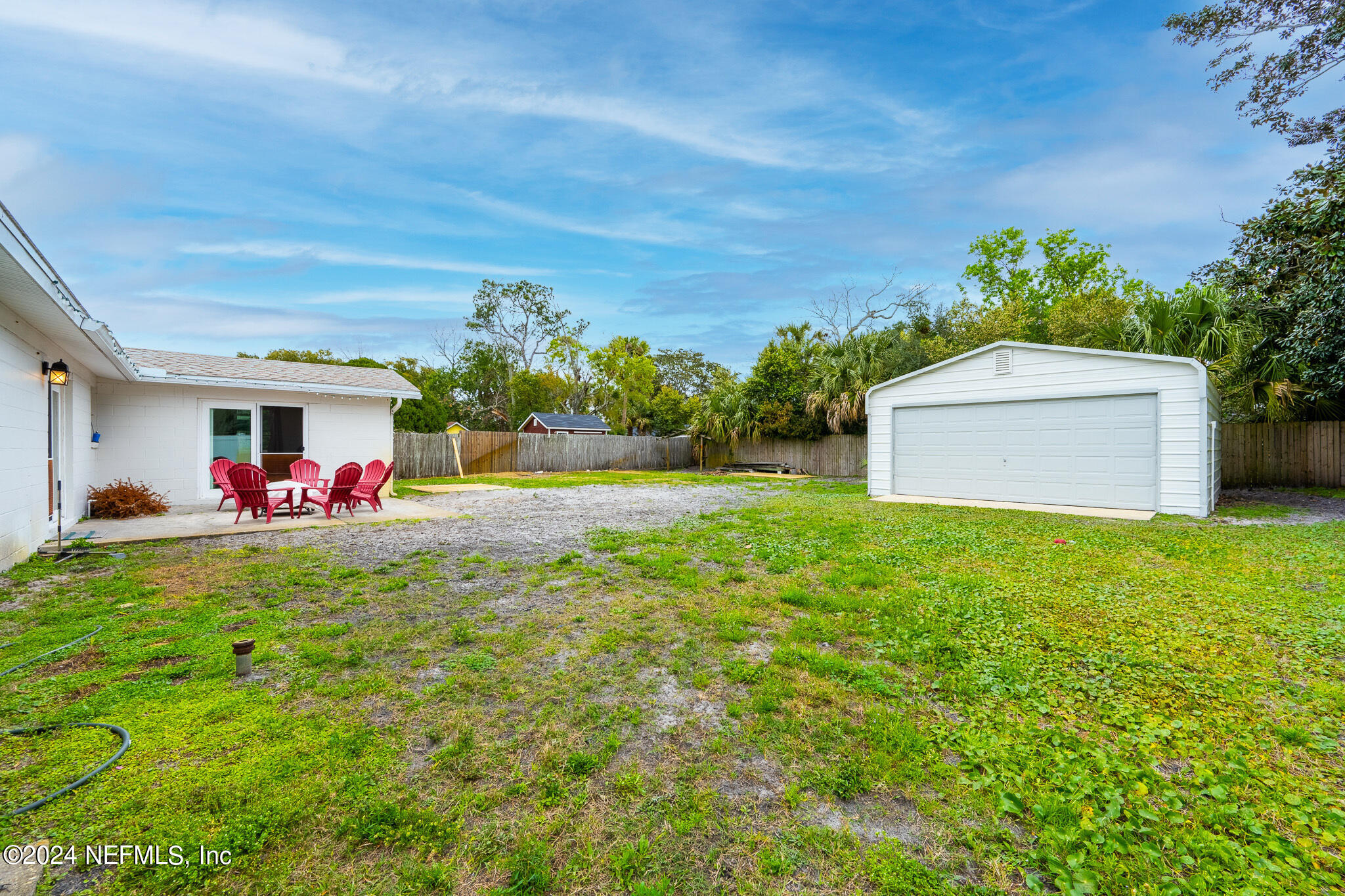 301 Penman Road Neptune Beach, FL 32266 - Photo 25 of 31 a front view of house with yard and entertaining space