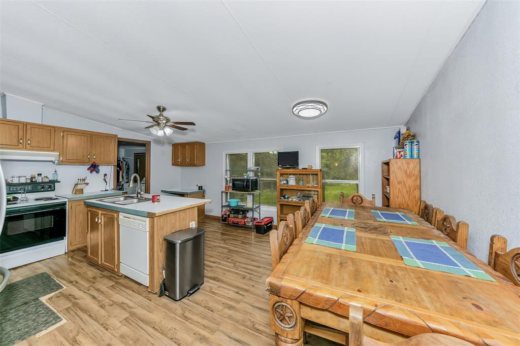 228 Slayden Road Sunset, TX 76270 - Photo 10 of 23 Large kitchen with lots of cabinets!