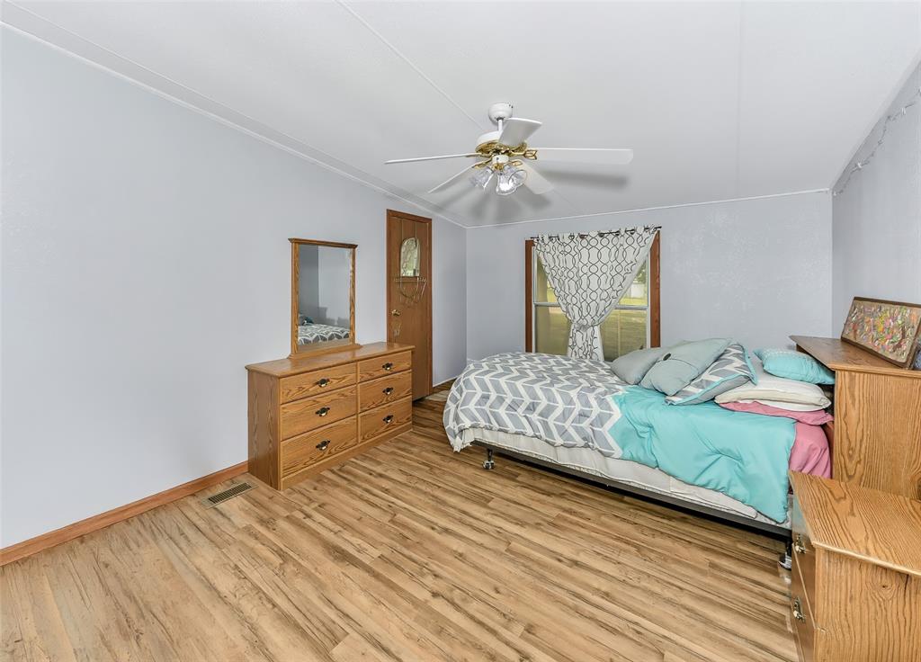 228 Slayden Road Sunset, TX 76270 - Photo 14 of 23 Secondary bedroom.