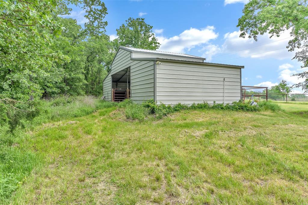 228 Slayden Road Sunset, TX 76270 - Photo 4 of 23 3-stall barn with water accessible.