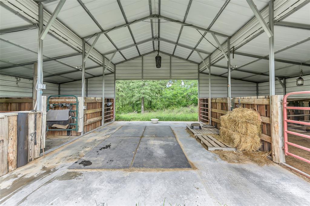 228 Slayden Road Sunset, TX 76270 - Photo 5 of 23 Barn interior.