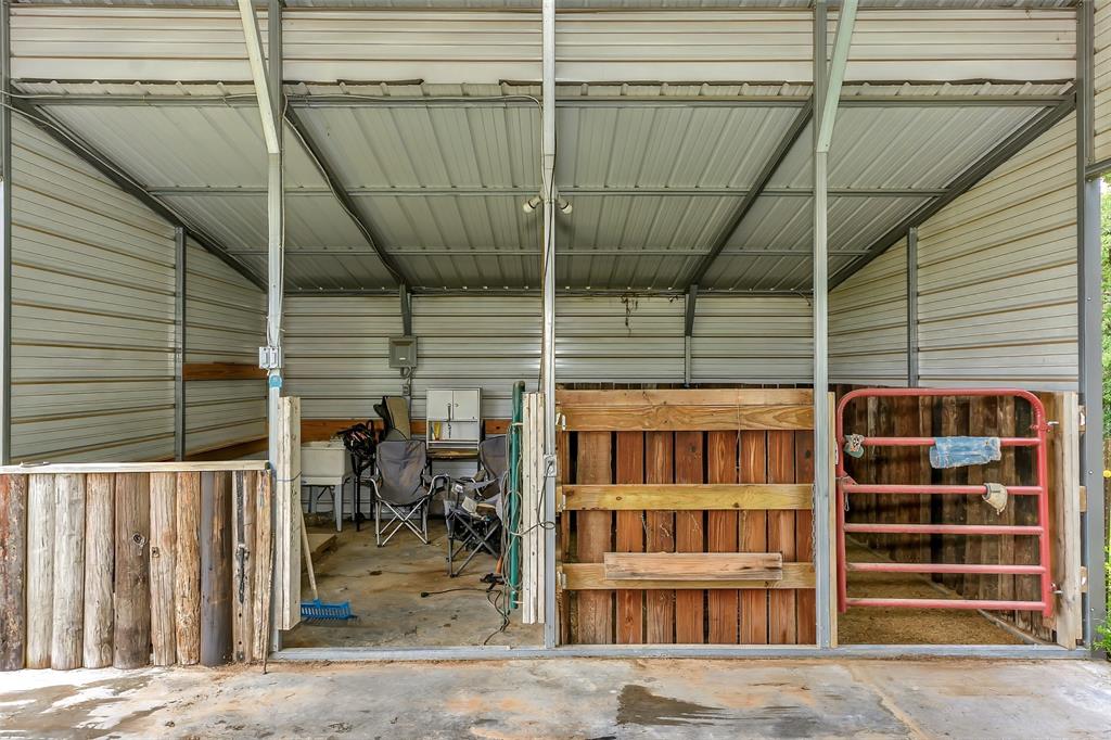 228 Slayden Road Sunset, TX 76270 - Photo 8 of 23 Stall and washroom.