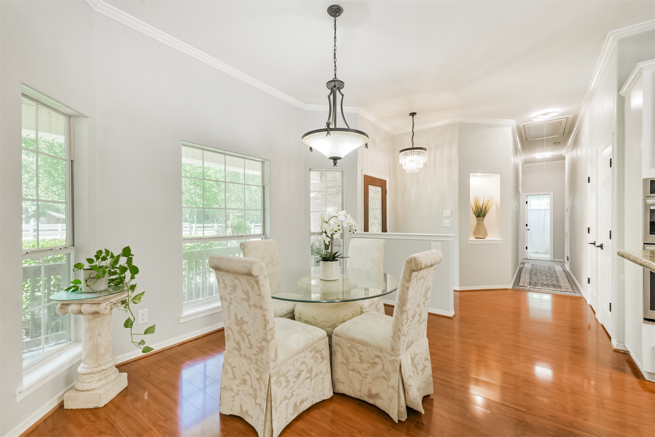 6002 Ranch Park Road Magnolia, TX 77354 - Photo 15 of 49 This bright dining area features elegantwood floors and large windows!