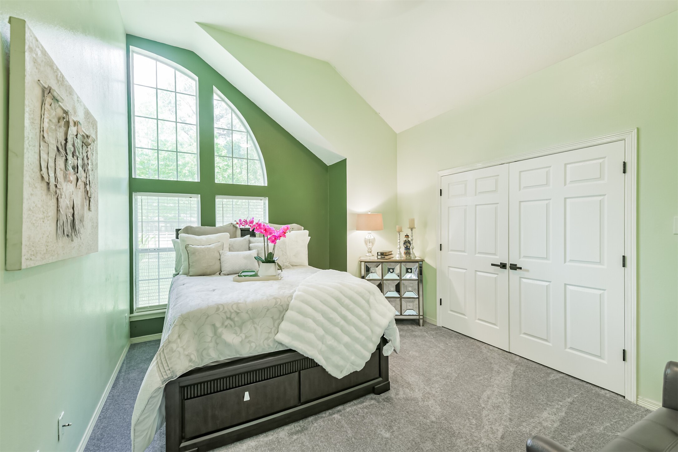 6002 Ranch Park Road Magnolia, TX 77354 - Photo 21 of 49 The Second bedroom features a vaulted ceiling and a large arched window that allows plenty of natural light.