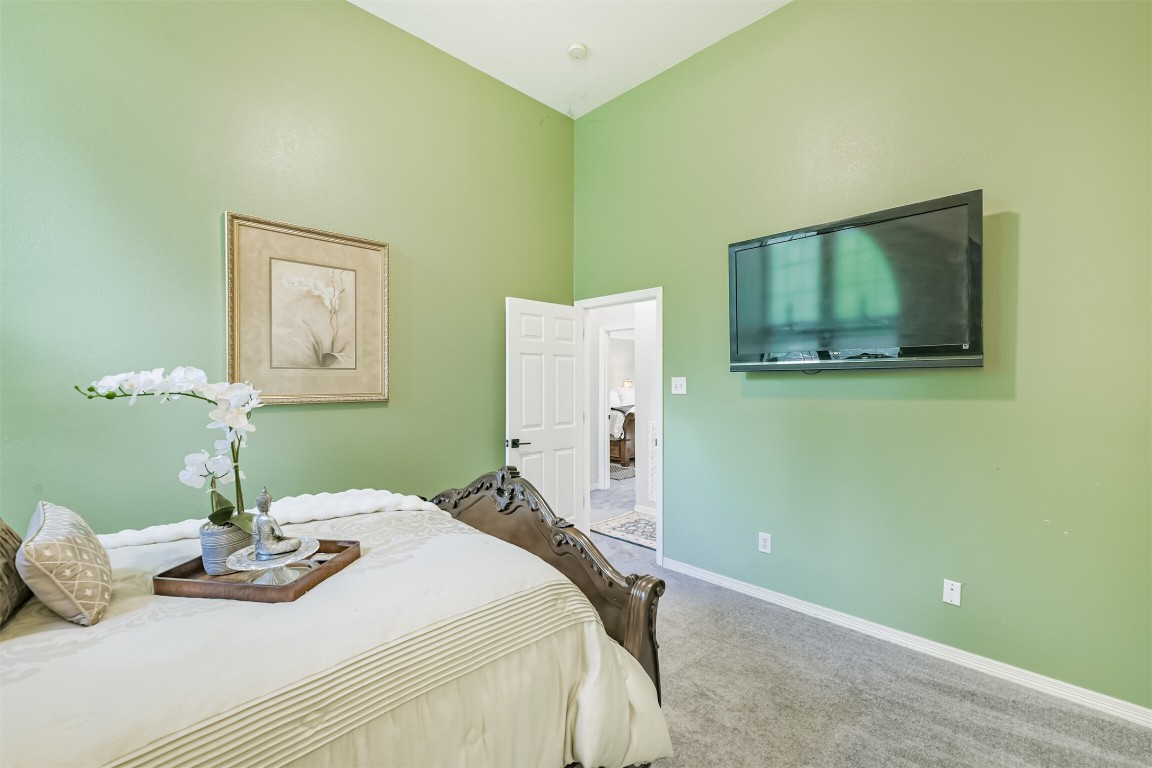 6002 Ranch Park Road Magnolia, TX 77354 - Photo 24 of 49 Another View of the Thisrd bedroom features a soft green wall with a mounted TV.