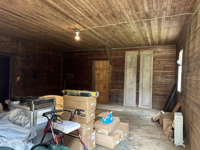 a patio with a table and chairs