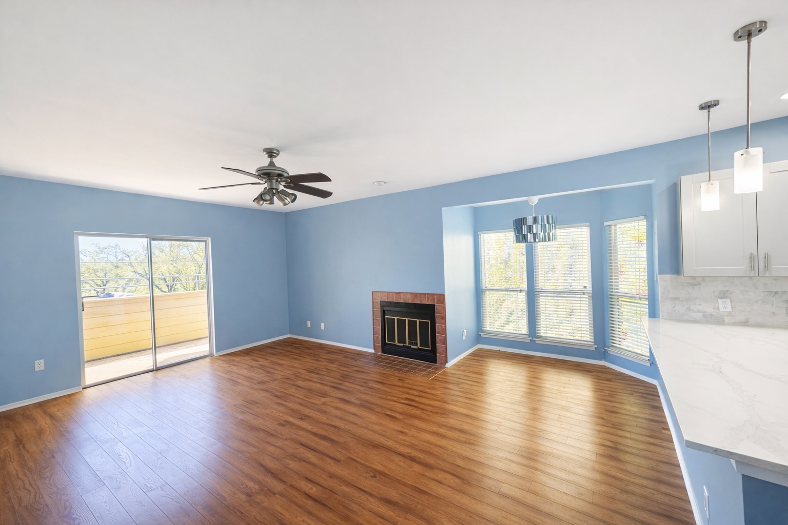 808 West 29th Street, Unit 206 Austin, TX 78705 - Photo 11 of 17 a view of an empty room with window and wooden floor