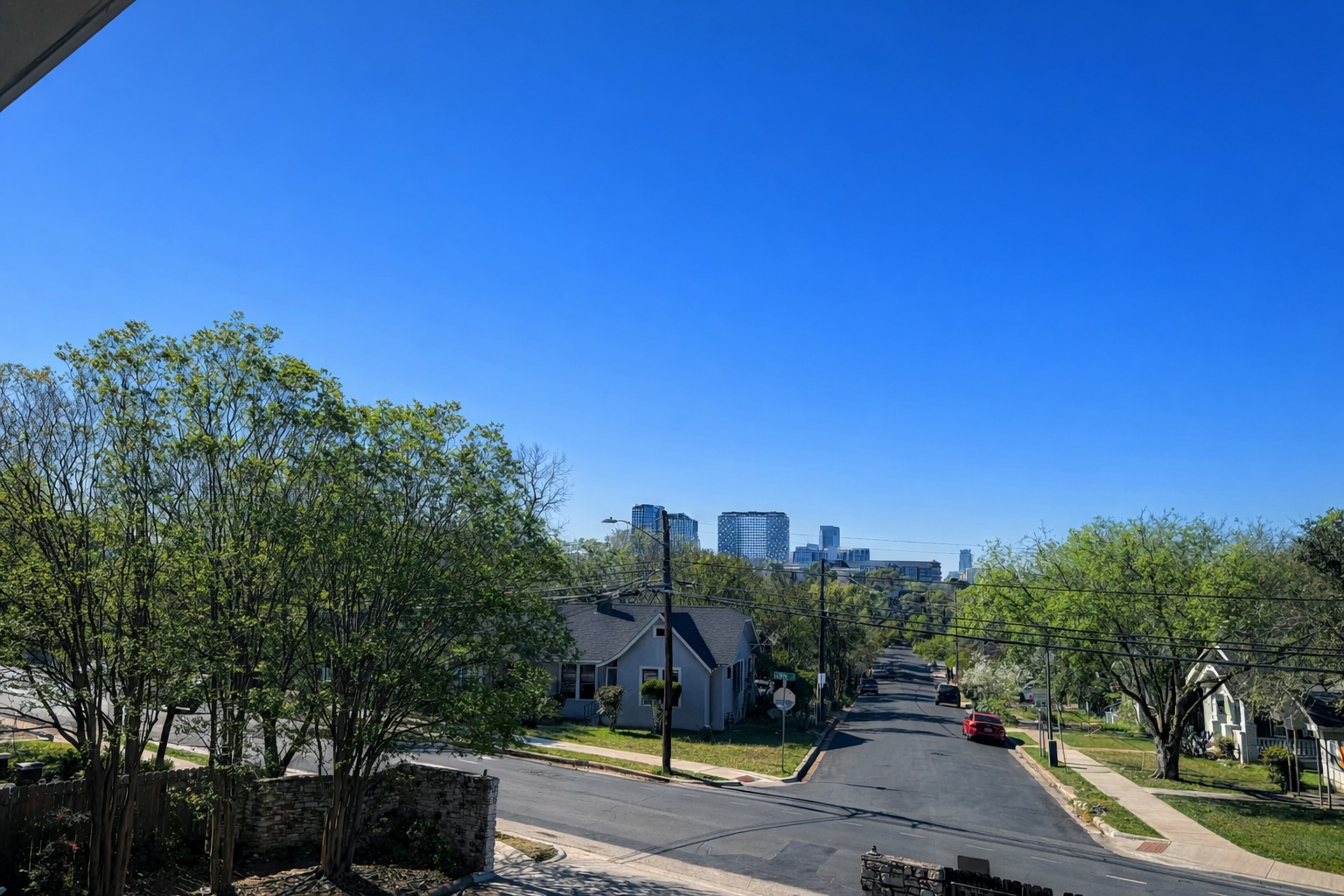 808 West 29th Street, Unit 206 Austin, TX 78705 - Photo 13 of 17 a view of a swimming pool and trees in the background