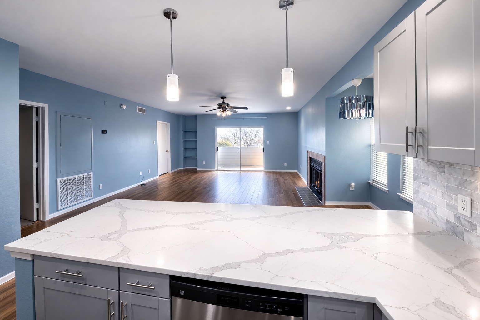808 West 29th Street, Unit 206 Austin, TX 78705 - Photo 16 of 17 a view of a kitchen with a sink a refrigerator and wooden floor