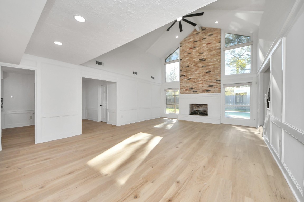 18803 Oakway Drive Spring, TX 77388 - Photo 17 of 47 a view of livingroom with fireplace and window
