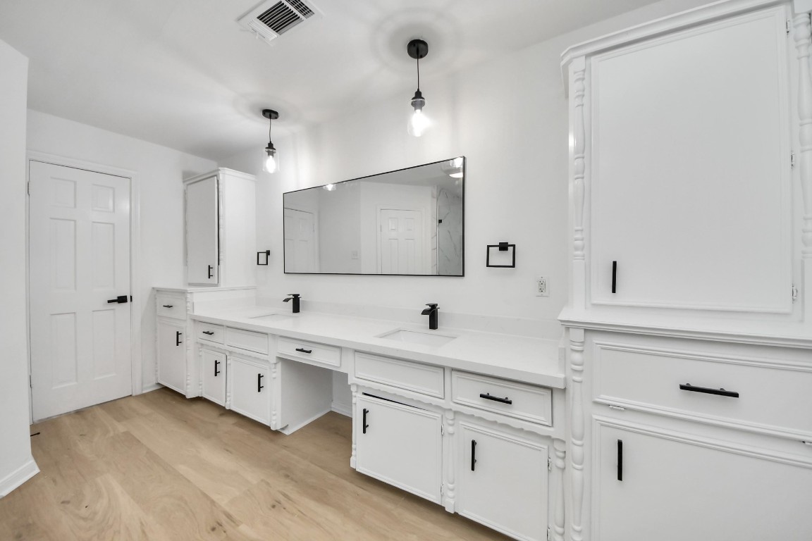 18803 Oakway Drive Spring, TX 77388 - Photo 28 of 47 a bathroom with a double vanity sink mirror and