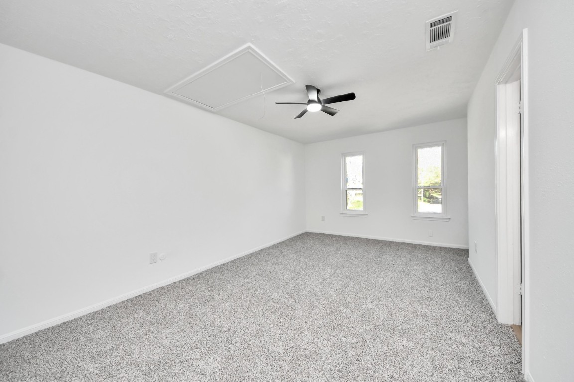 18803 Oakway Drive Spring, TX 77388 - Photo 29 of 47 a view of an empty room with a window