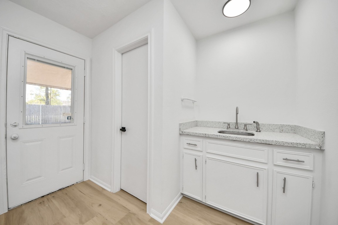 18803 Oakway Drive Spring, TX 77388 - Photo 39 of 47 a bathroom with a granite countertop sink and mirror