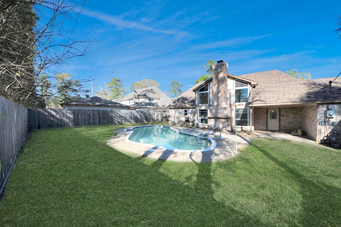 18803 Oakway Drive Spring, TX 77388 - Photo 40 of 47 a view of a house with a yard porch and sitting area