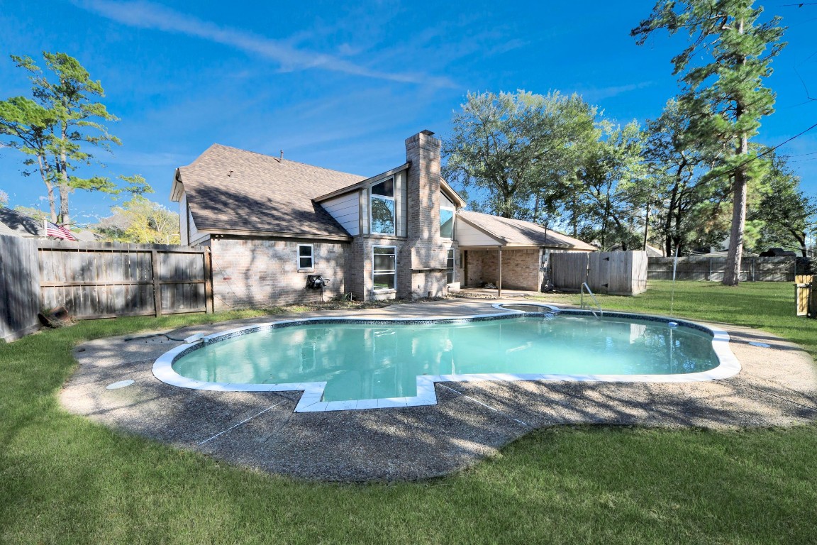 18803 Oakway Drive Spring, TX 77388 - Photo 41 of 47 a view of a house with swimming pool