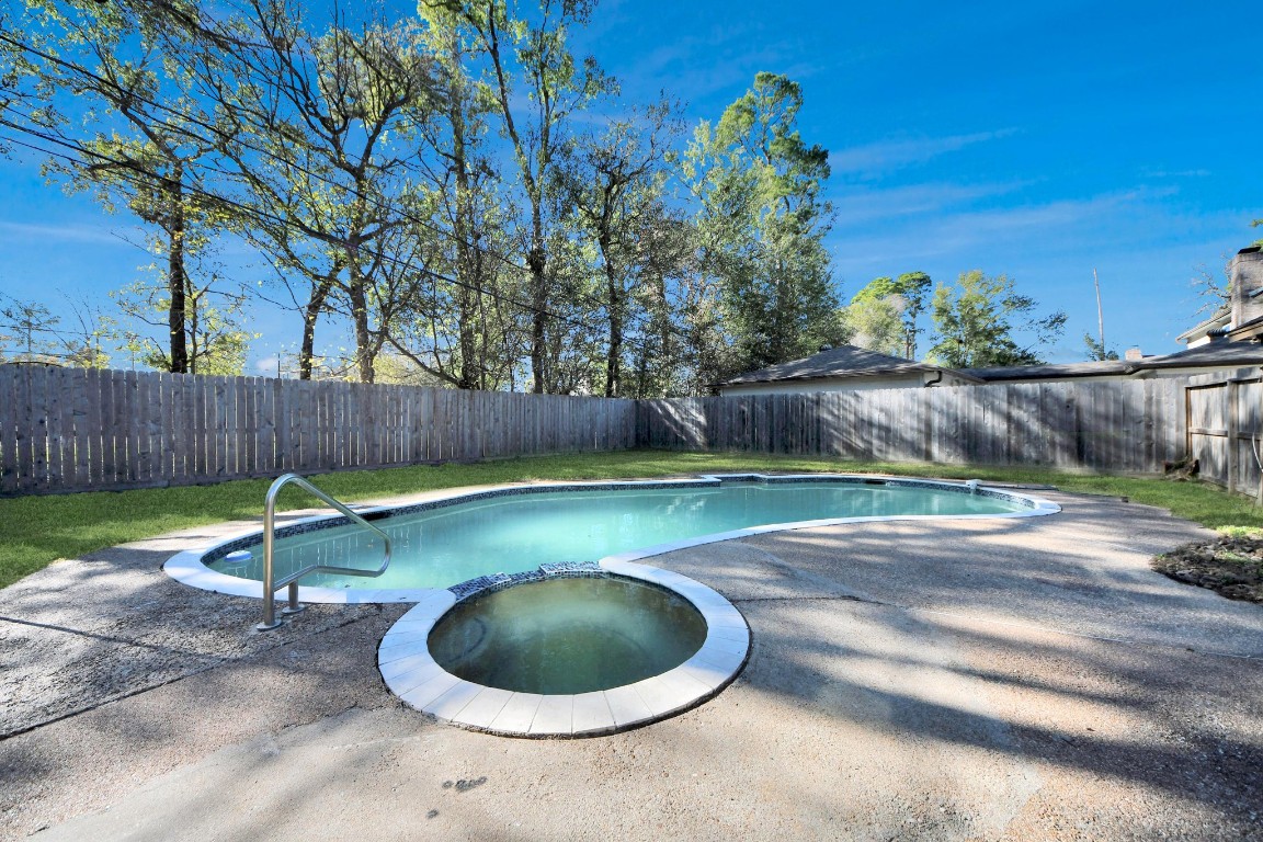 18803 Oakway Drive Spring, TX 77388 - Photo 42 of 47 a view of a backyard with a tub