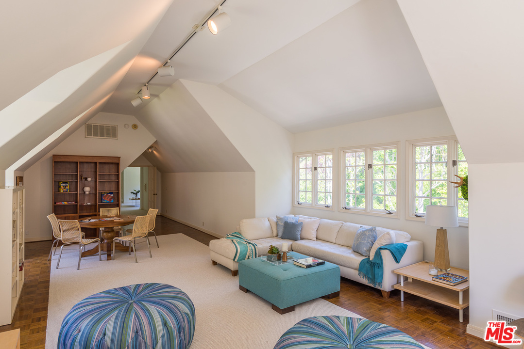 1420 Moraga Drive Los Angeles, CA 90049 - Photo 28 of 38 a living room with furniture and wooden floor
