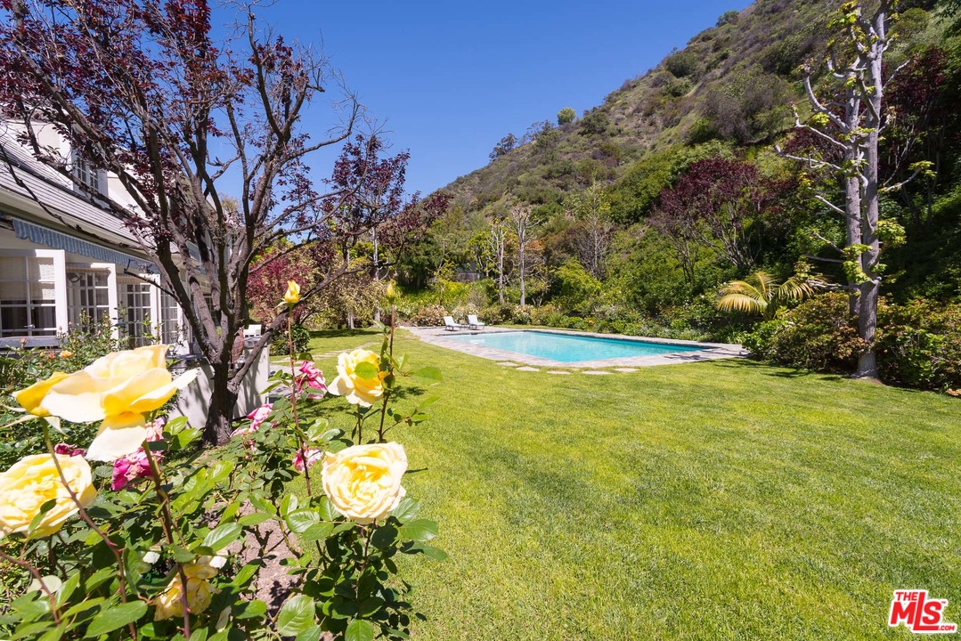 1420 Moraga Drive Los Angeles, CA 90049 - Photo 31 of 38 a view of yard with large trees