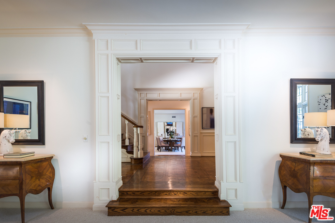 1420 Moraga Drive Los Angeles, CA 90049 - Photo 6 of 38 a view of a hallway with livingroom and living room