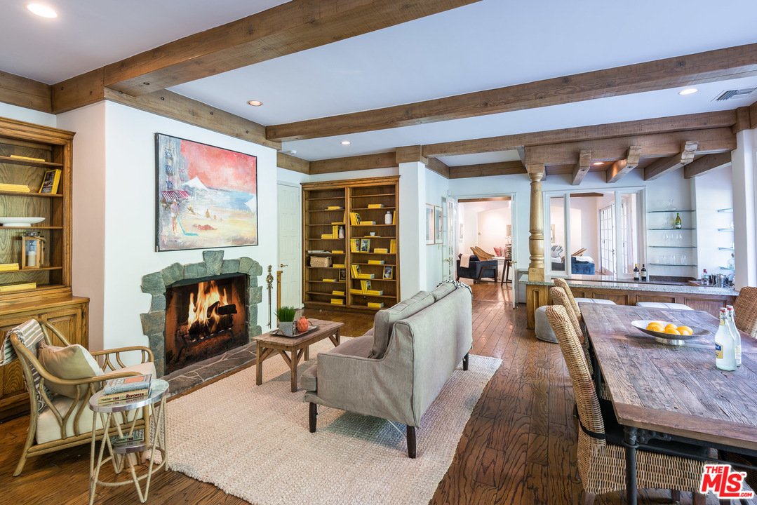 1420 Moraga Drive Los Angeles, CA 90049 - Photo 10 of 38 a living room with fireplace furniture and a fireplace