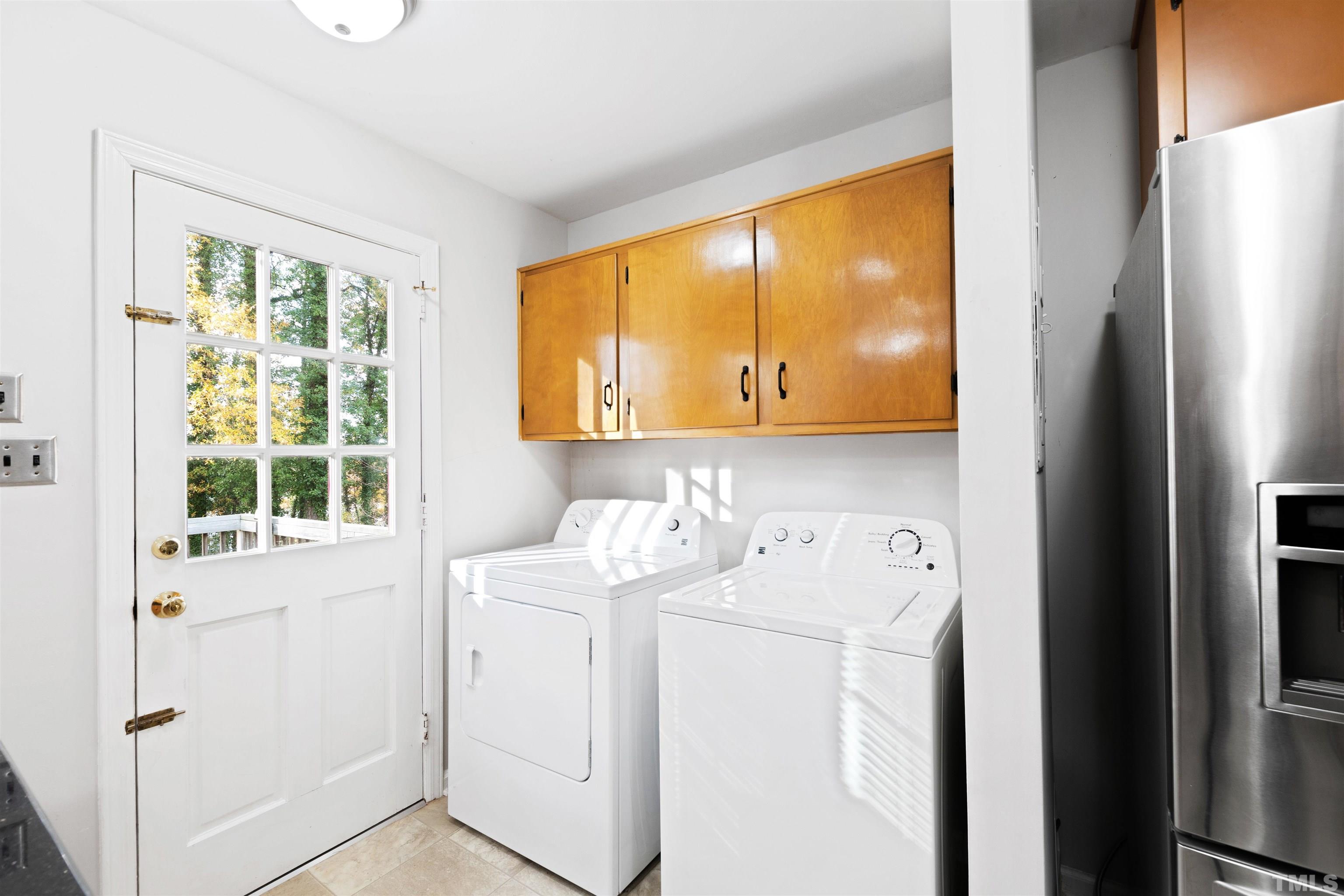 2209 Watkins Street Raleigh, NC 27604 - Photo 13 of 29 a utility room with dryer and washer