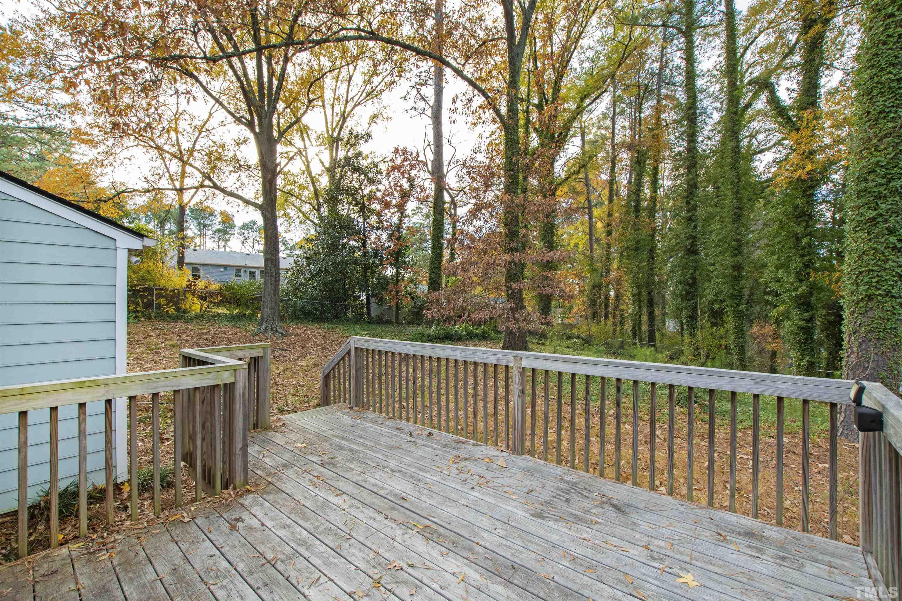2209 Watkins Street Raleigh, NC 27604 - Photo 26 of 29 a view of balcony with wooden floor and fence