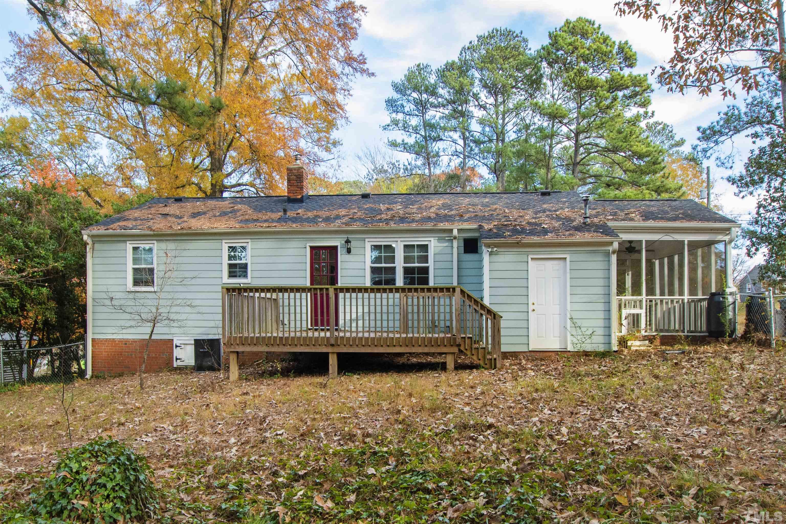 2209 Watkins Street Raleigh, NC 27604 - Photo 27 of 29 front view of a house with a yard