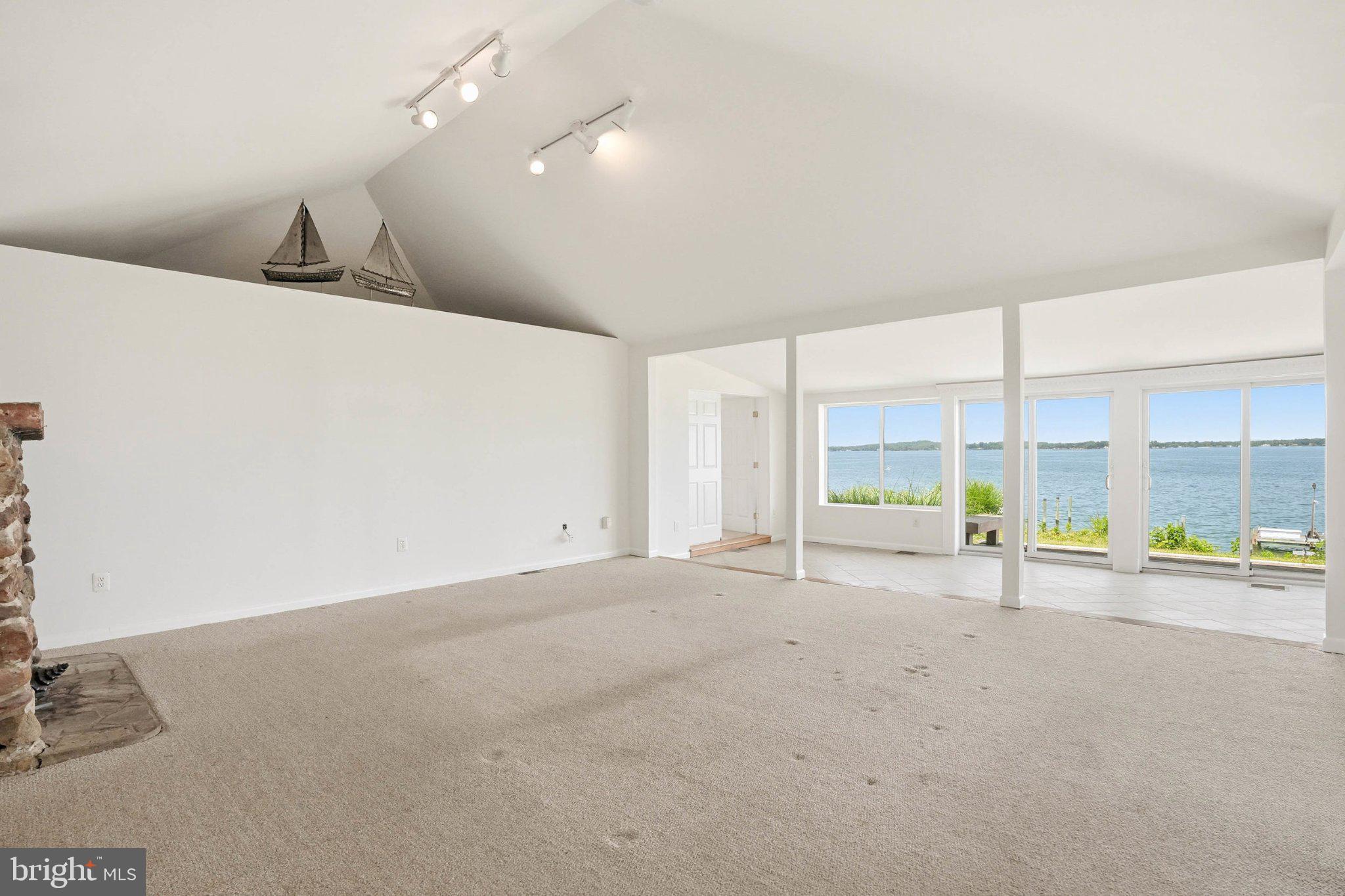 1100 River Bay Road Annapolis, MD 21409 - Photo 12 of 67 a view of an empty room with a window