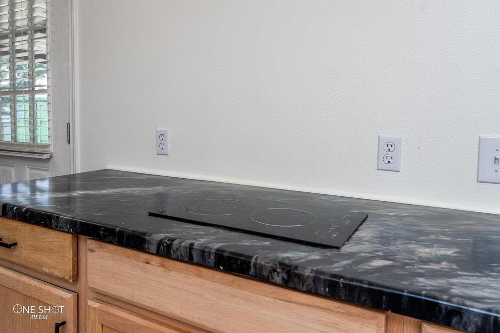 310 10th Street Hawley, TX 79525 - Photo 15 of 29 a view of kitchen counter space and stove top oven