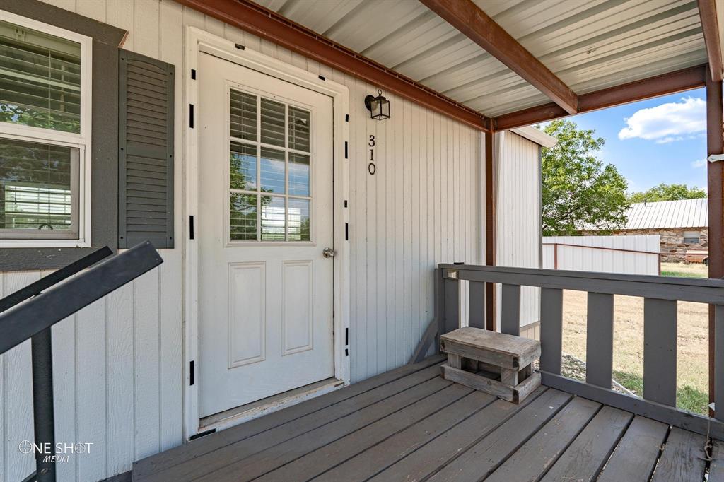 310 10th Street Hawley, TX 79525 - Photo 3 of 29 a view of a two chairs in the balcony