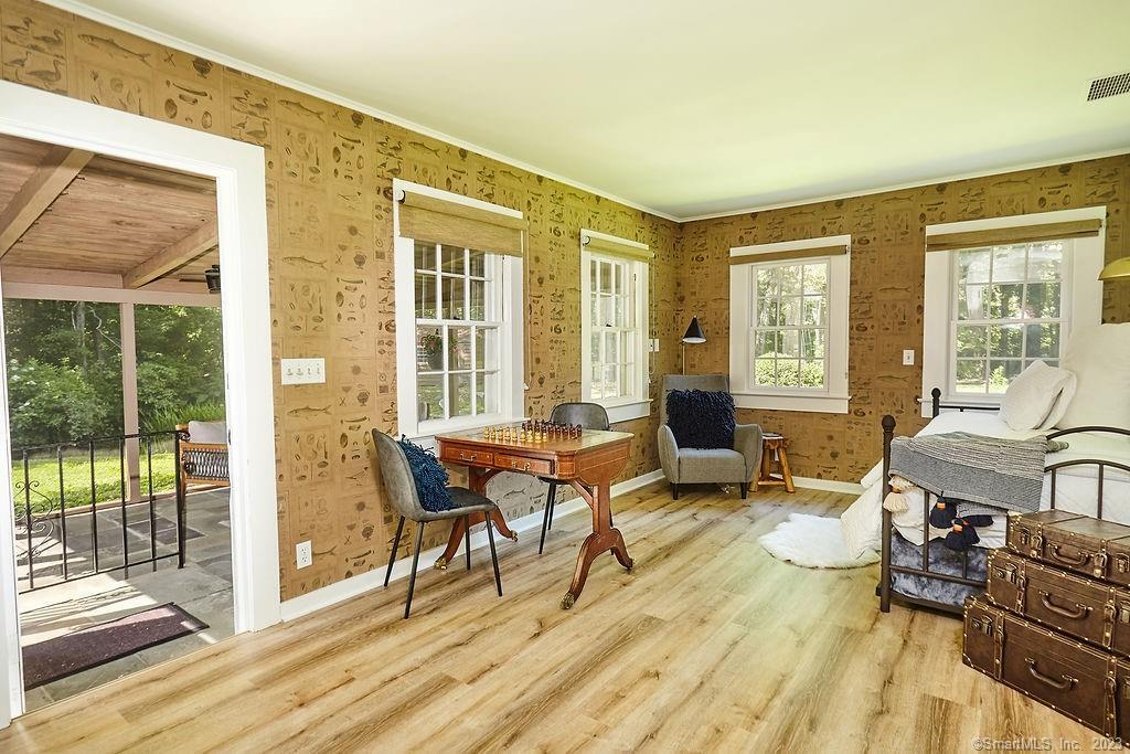 94 Partrick Road Westport, CT 06880 - Photo 13 of 17 a living room with furniture and a wooden floor