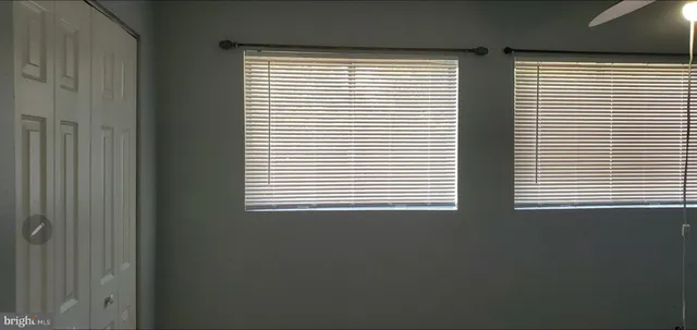 a view of a room that has a window in it