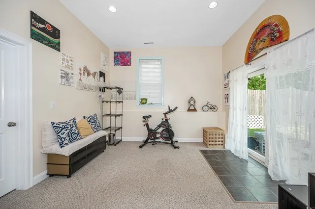 a living room with furniture and a couch