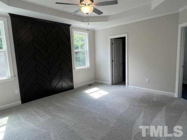25 Pilot Ridge Road Zebulon, NC 27597 - Photo 7 of 16 a view of empty room with window and ceiling fan