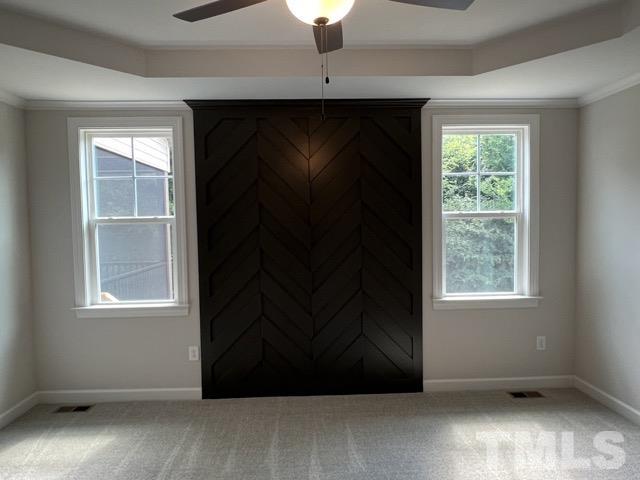 25 Pilot Ridge Road Zebulon, NC 27597 - Photo 9 of 16 an empty room with windows