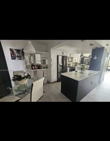 a upper view of a kitchen with cabinets