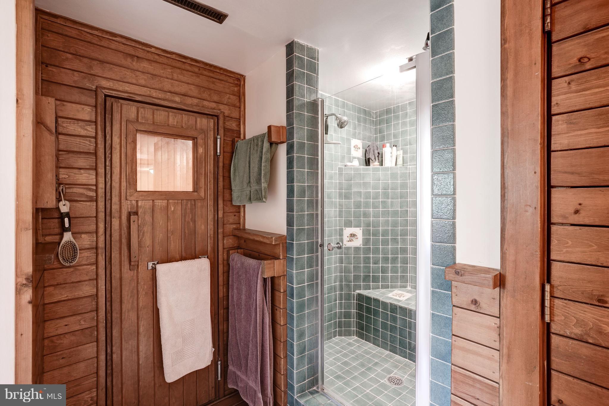 11302 Fairway Drive Reston, VA 20190 - Photo 22 of 30 a bathroom with a shower
