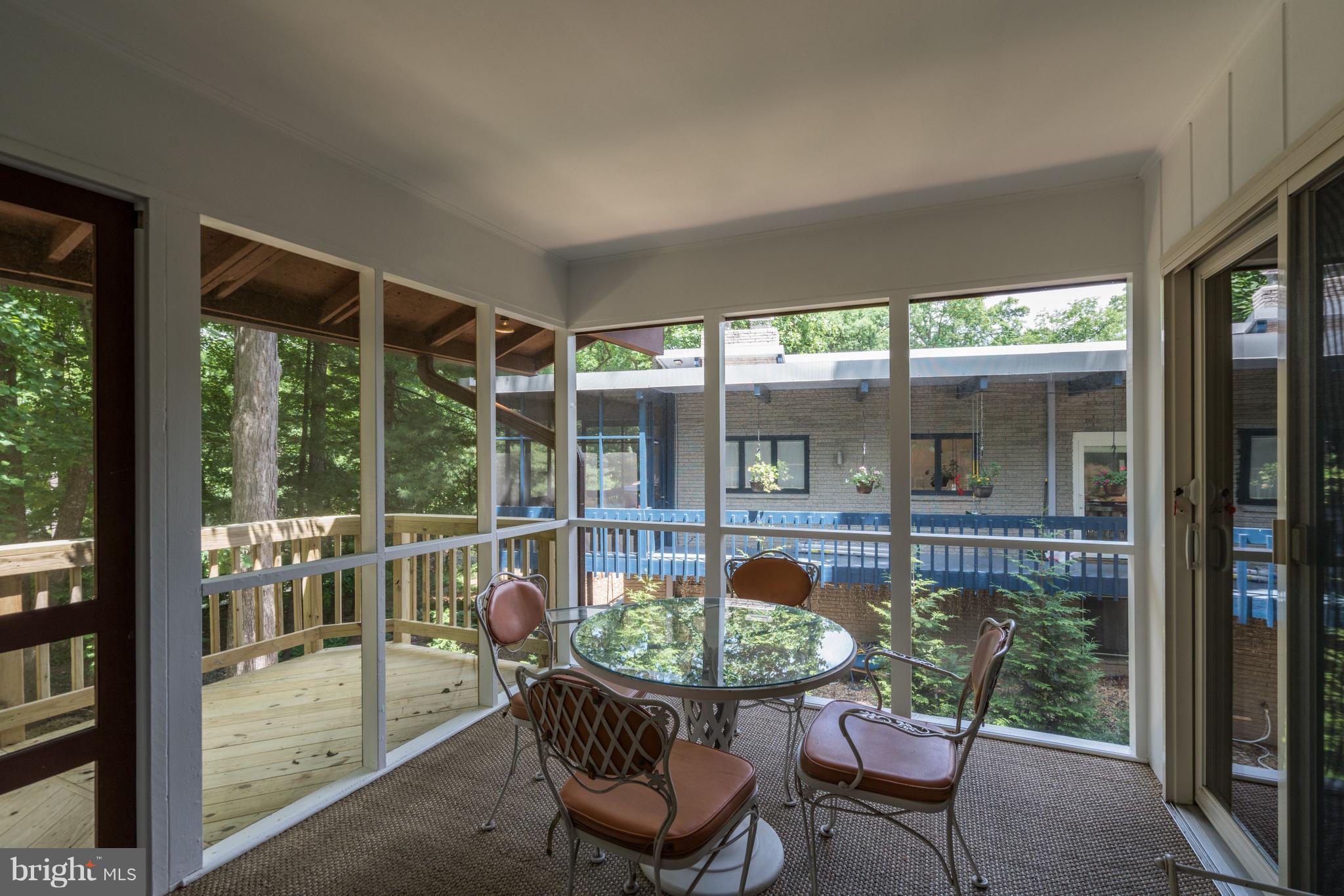 11302 Fairway Drive Reston, VA 20190 - Photo 27 of 30 a view of a chair and tables in the balcony