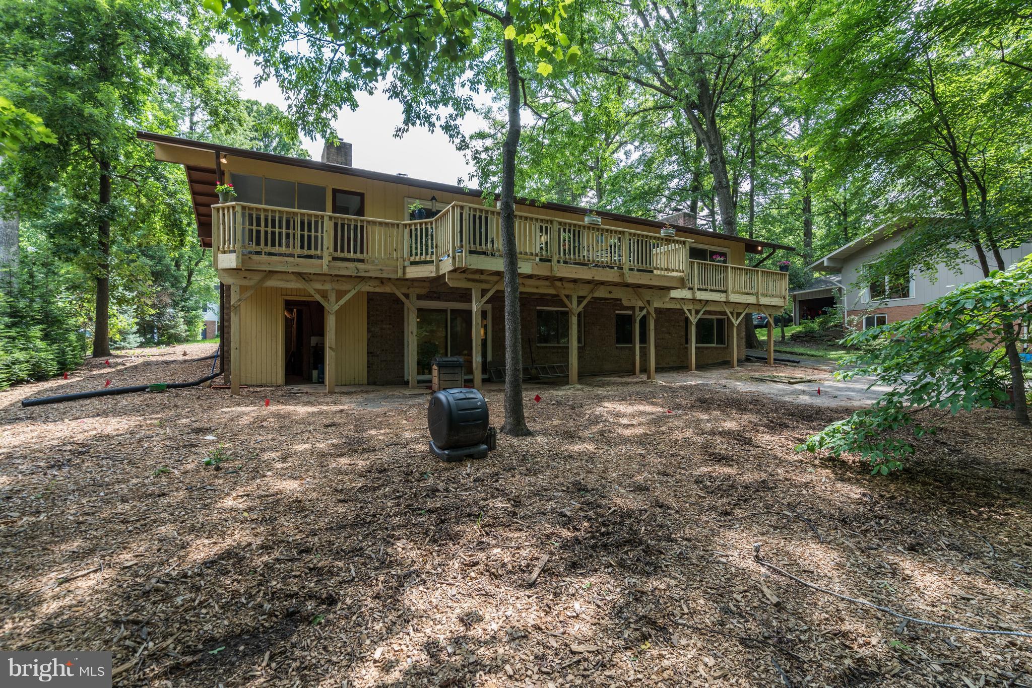 11302 Fairway Drive Reston, VA 20190 - Photo 29 of 30 a view of a house with a yard and porch