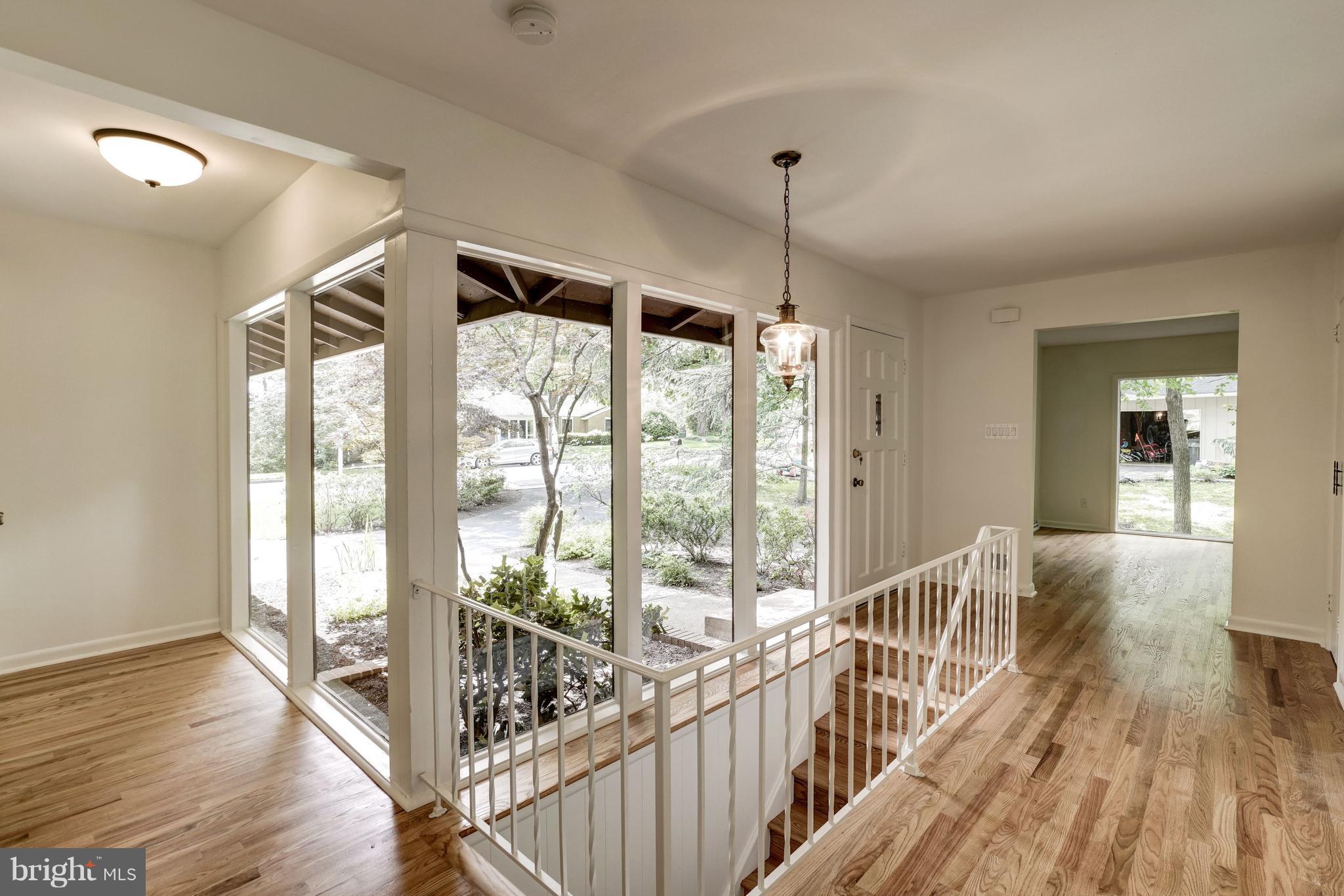 11302 Fairway Drive Reston, VA 20190 - Photo 4 of 30 a view of hallway with wooden floor