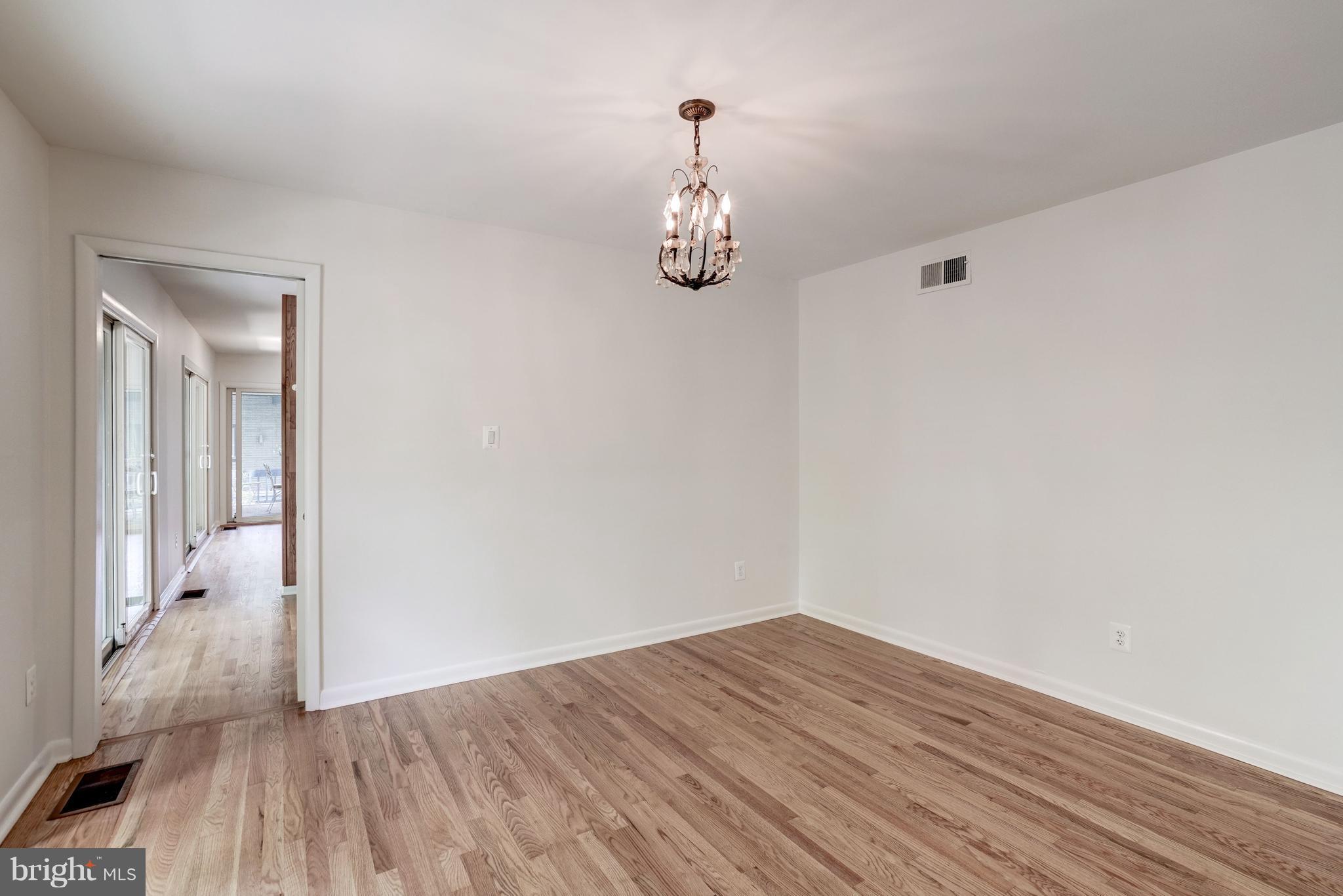 11302 Fairway Drive Reston, VA 20190 - Photo 7 of 30 a view of empty room with wooden floor