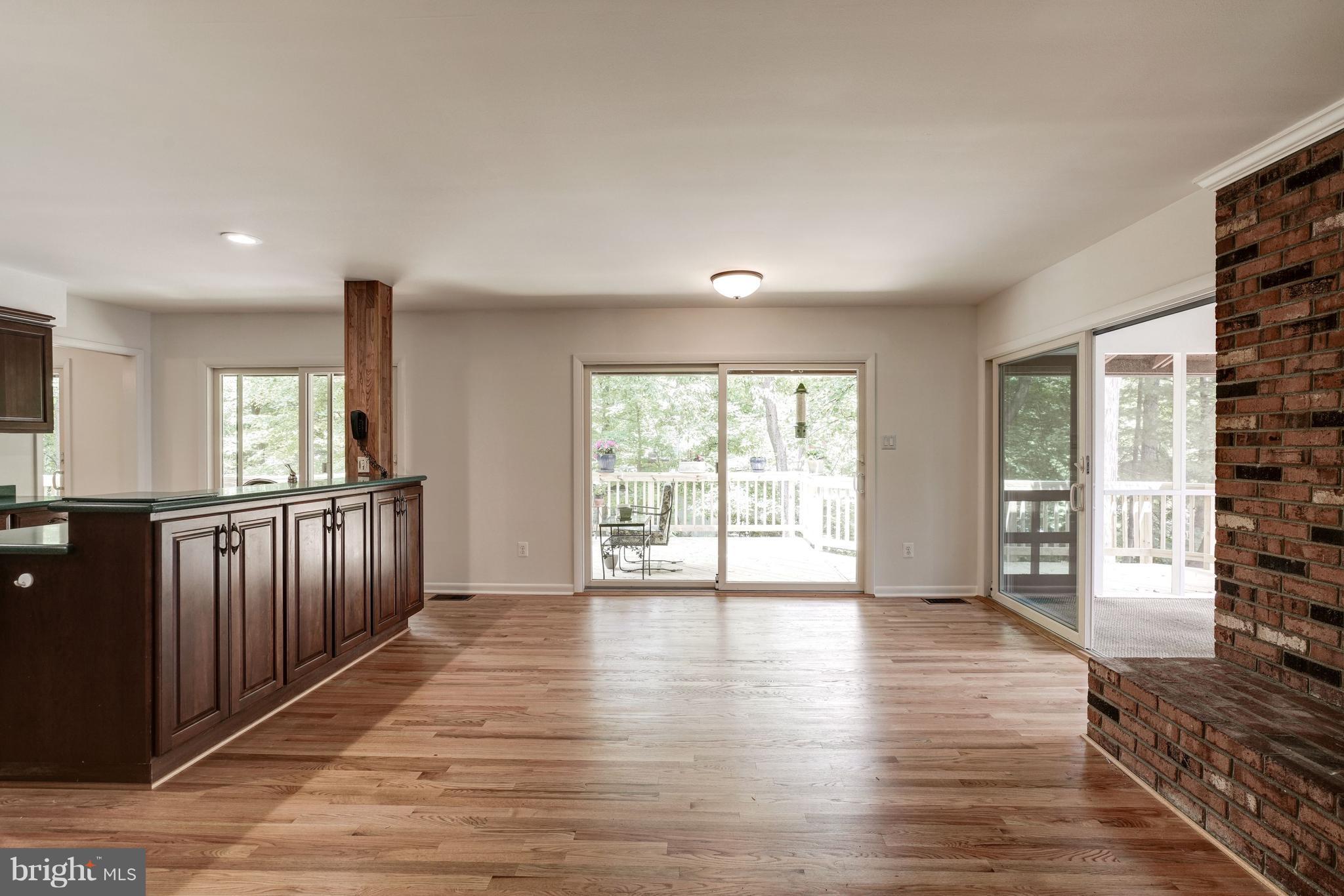 11302 Fairway Drive Reston, VA 20190 - Photo 9 of 30 wooden floor in an empty room with a window