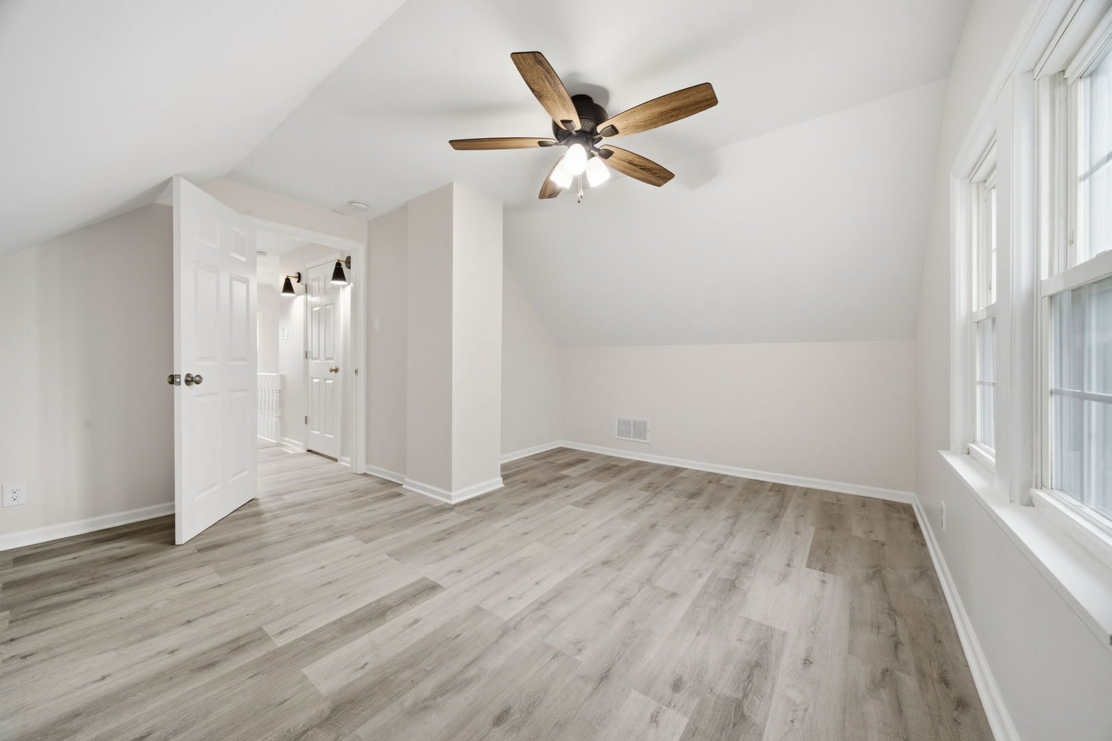 17909 Rose Street Lansing, IL 60438 - Photo 19 of 27 wooden floor in an empty room with a window