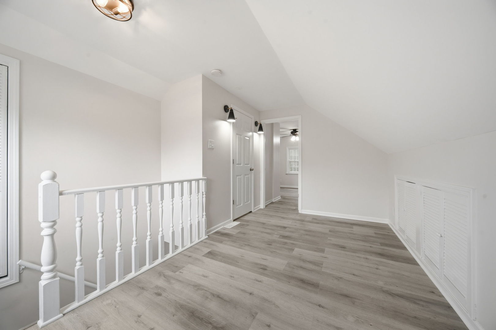 17909 Rose Street Lansing, IL 60438 - Photo 20 of 27 a view of a hallway with wooden floor