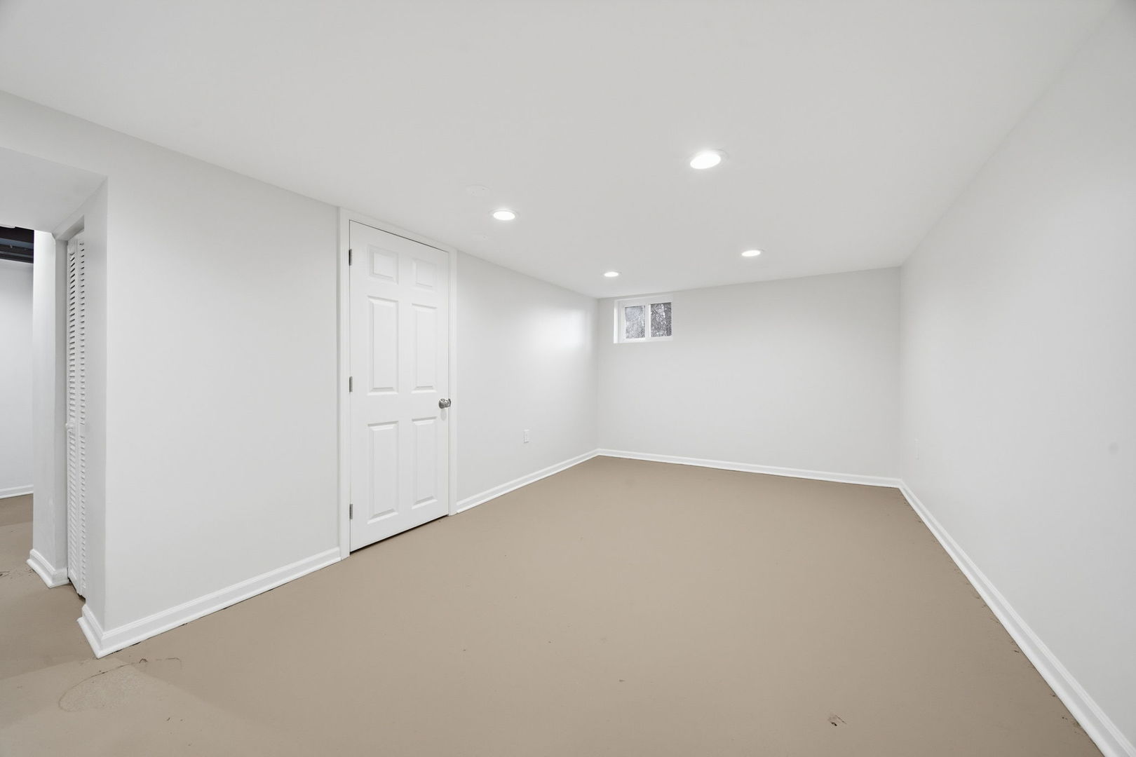 17909 Rose Street Lansing, IL 60438 - Photo 23 of 27 an empty room with a empty space and windows
