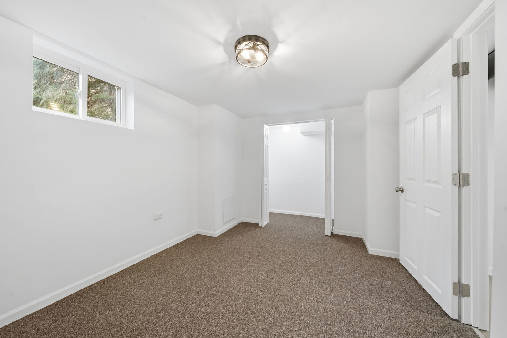 17909 Rose Street Lansing, IL 60438 - Photo 25 of 27 a view of an empty room with a window