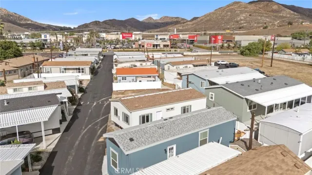 an aerial view of residential houses and outdoor space