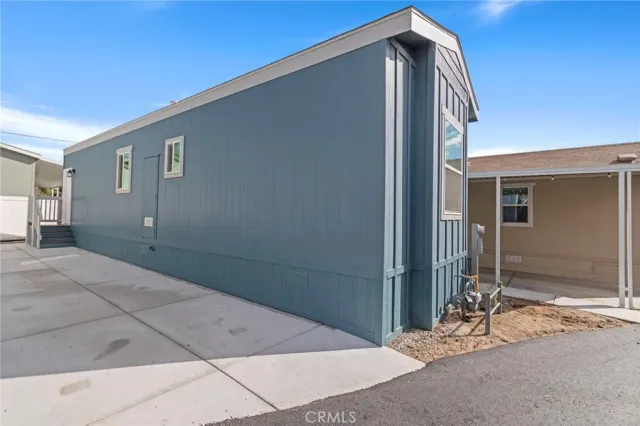 a front view of a house with many windows
