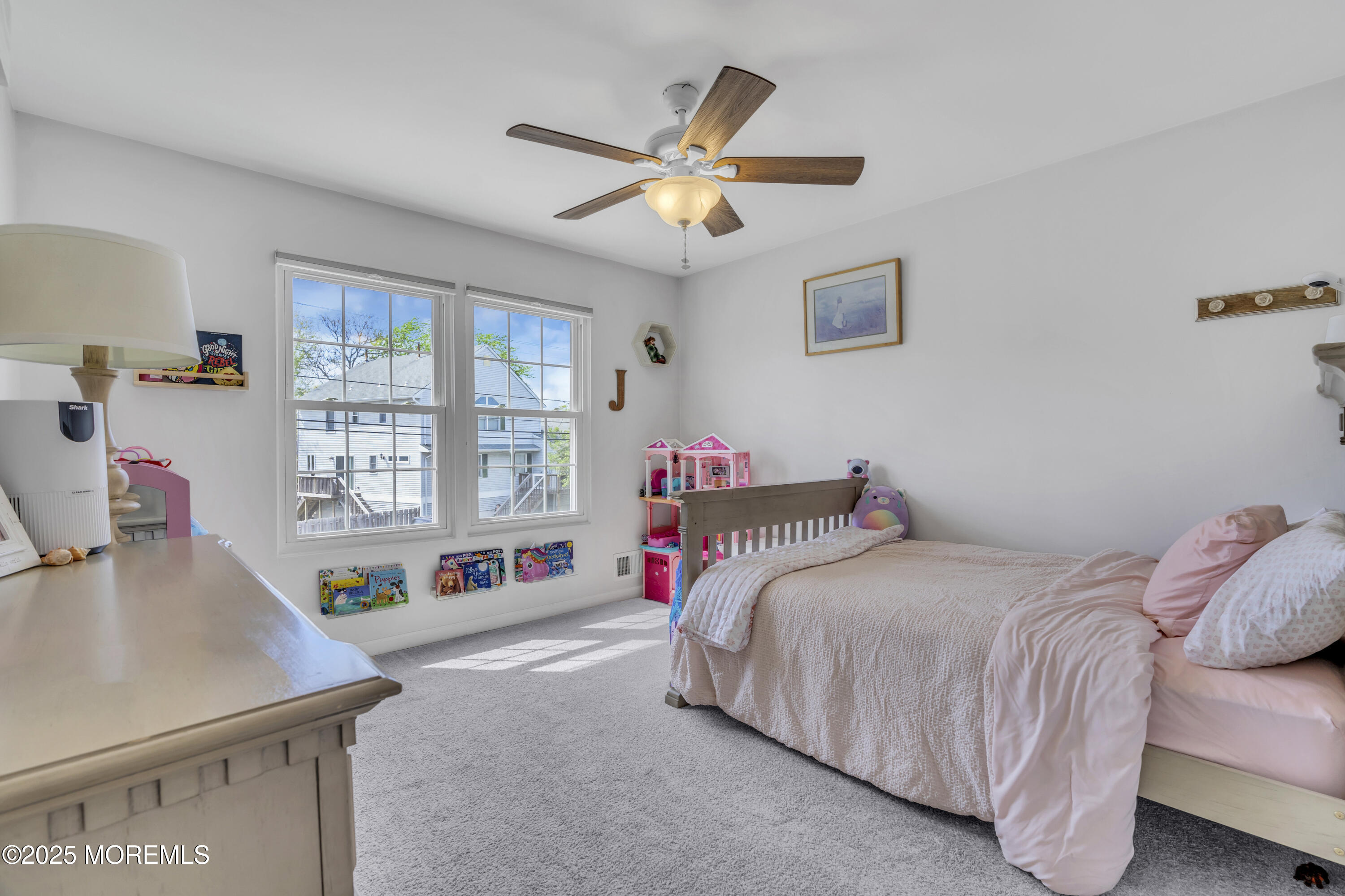 650 Drum Point Road Brick, NJ 08723 - Photo 31 of 42 a bedroom with a bed and a window