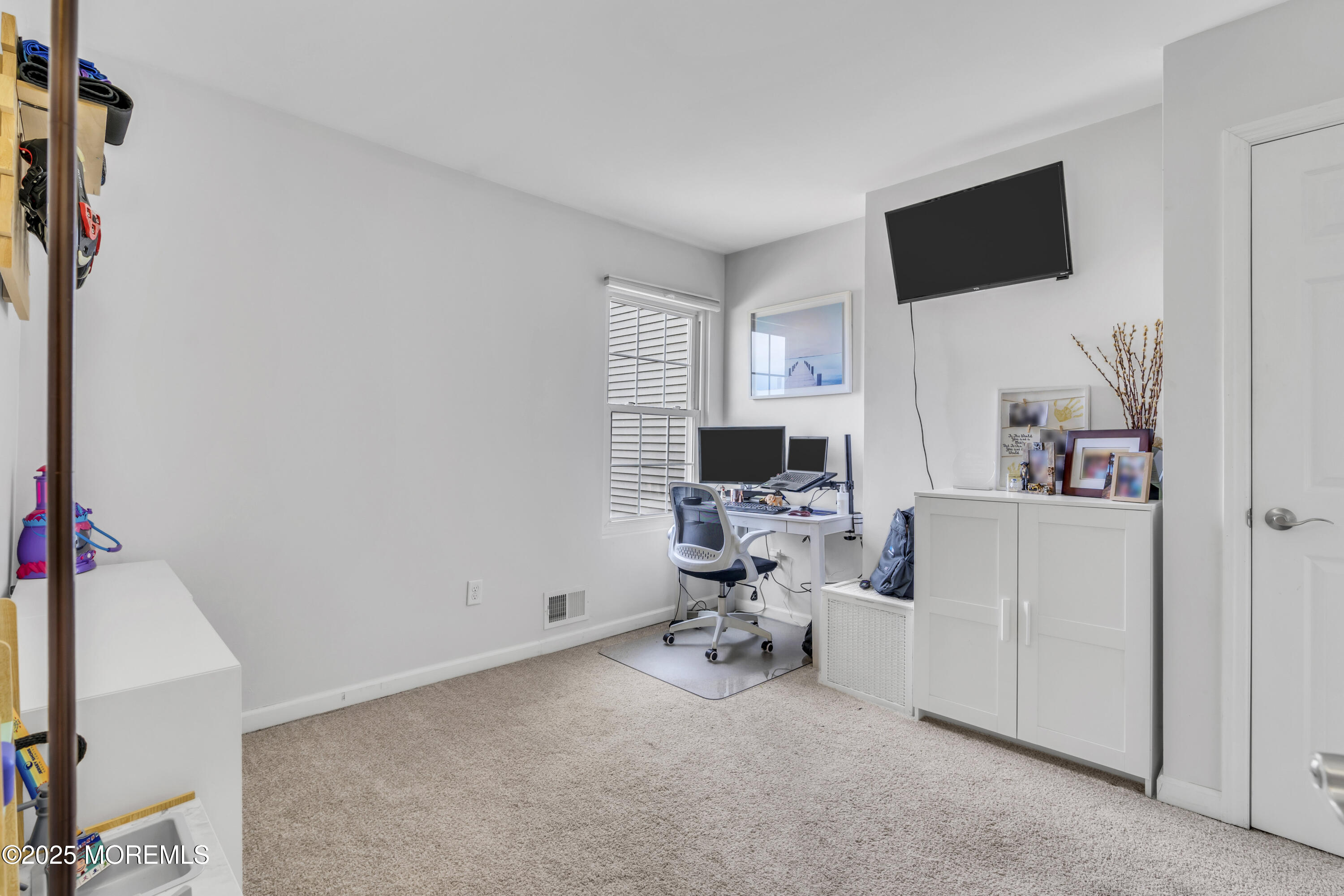650 Drum Point Road Brick, NJ 08723 - Photo 39 of 42 a view of a livingroom with workspace and a window